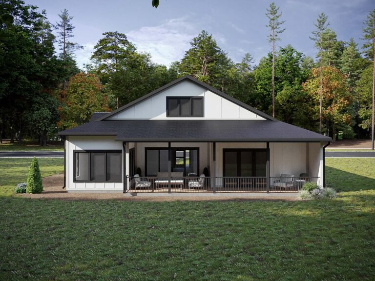 A modern, single-story house with a large wraparound porch surrounded by a lush, wooded landscape. The home features a gable roof, neutral exterior colors, and large windows that allow natural light to flood the interior. The expansive porch offers ample space for outdoor seating and relaxation, creating a peaceful and inviting atmosphere.