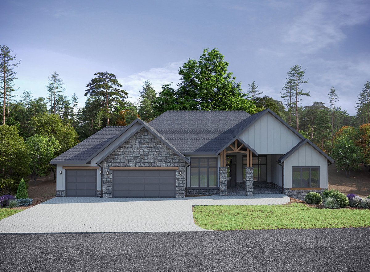 A modern, two-story home with a gabled roof, stone and siding exterior, and a large front porch. The home is surrounded by a lush, forested landscape with tall trees and greenery. The driveway leads up to a three-car garage, and the well-manicured lawn and landscaping add to the overall curb appeal of the property.