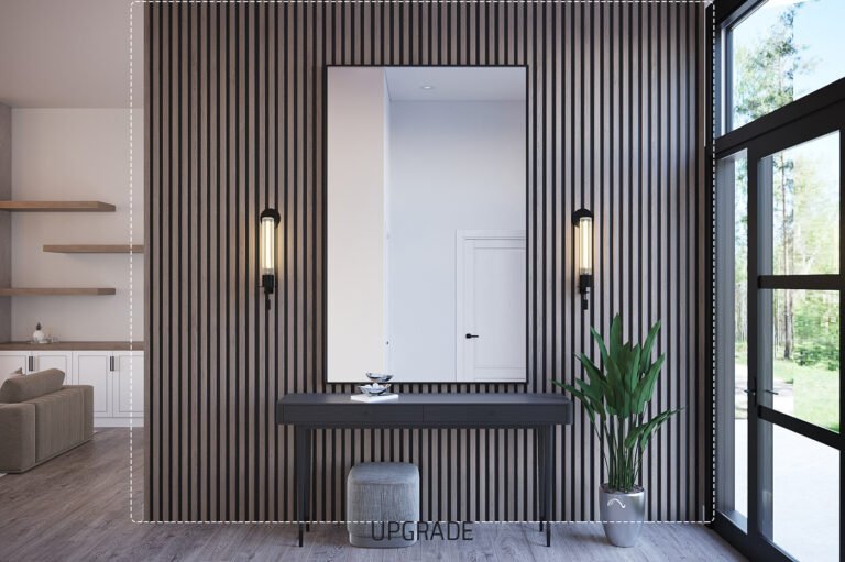 A modern and minimalist entryway with a black and white color scheme. The walls feature vertical wood paneling, creating a sleek and sophisticated look. A large mirror is centered on the wall, flanked by two wall sconces that provide warm lighting. A low console table with drawers sits below the mirror, and a potted plant adds a touch of greenery to the space. The room is filled with natural light from the large windows, creating a bright and airy atmosphere.